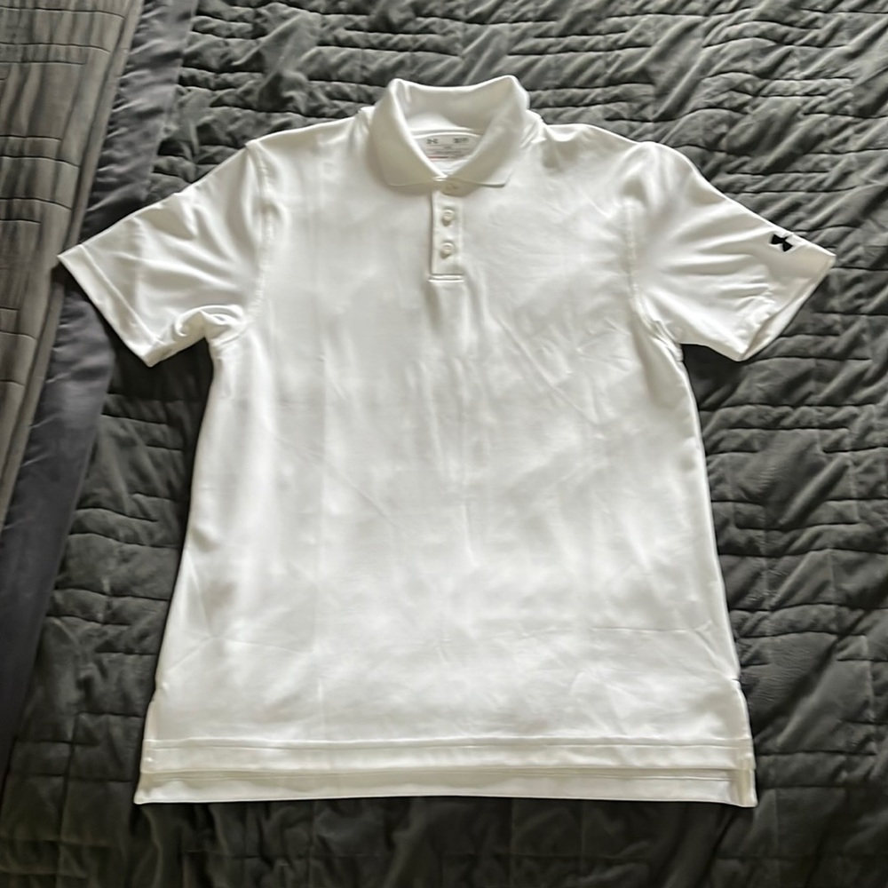 Plain white Under Armor golf shirt.